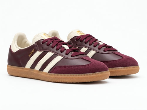Maroon sneaker, angled view showing metallic detail