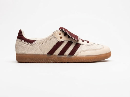 Cream white nylon low-top sneaker, side view